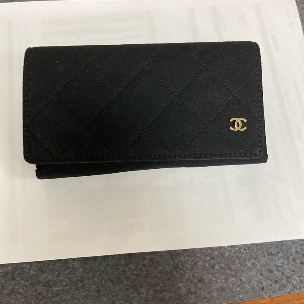 Woman’s black cloth Chanel eyeglass case